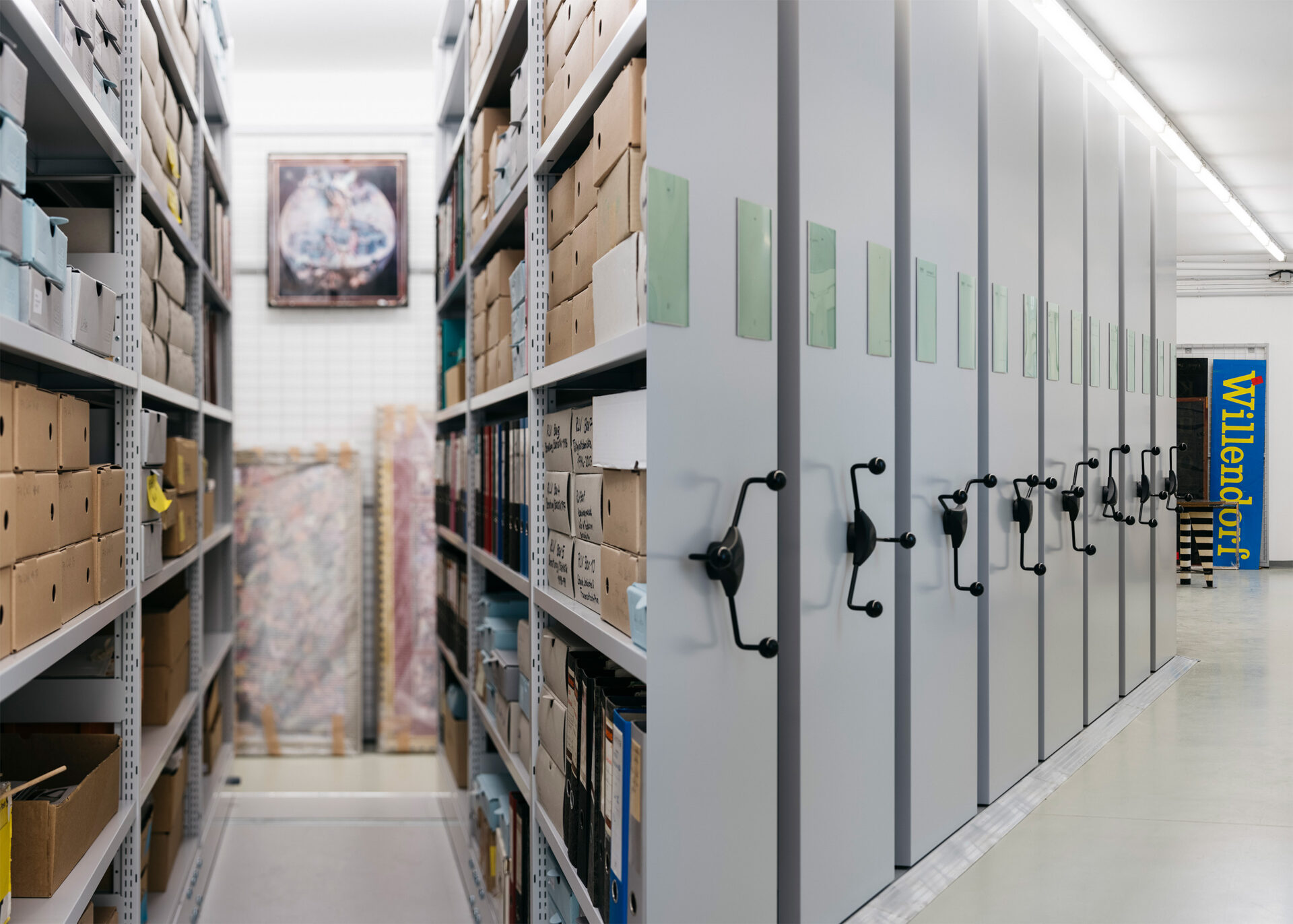 Image of a storage facility showcasing organized shelves filled with boxes and archival materials.